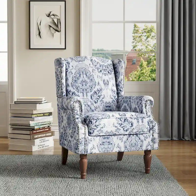 Fauteuil d'appoint à dossier haut avec clous décoratifs et coussin amovible