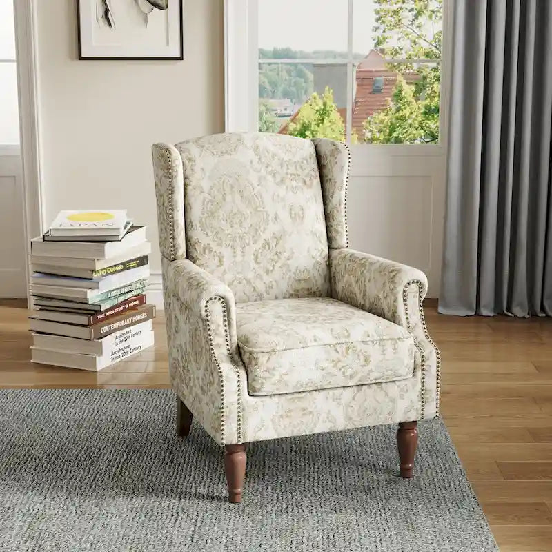Fauteuil d'appoint à dossier haut avec clous décoratifs et coussin amovible
