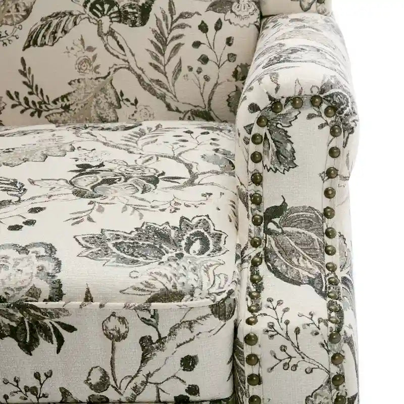 Fauteuil d'appoint à dossier haut avec clous décoratifs et coussin amovible