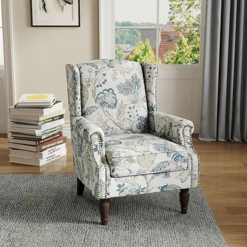 Fauteuil d'appoint à dossier haut avec clous décoratifs et coussin amovible